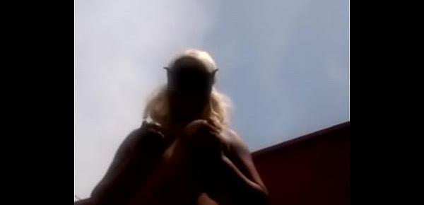 sexy black girl showing her boobs  outdoor